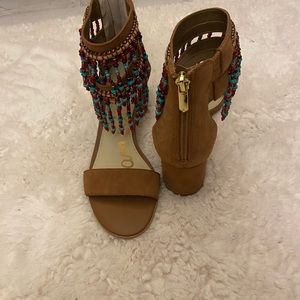 Beaded Sandals with back zipper.